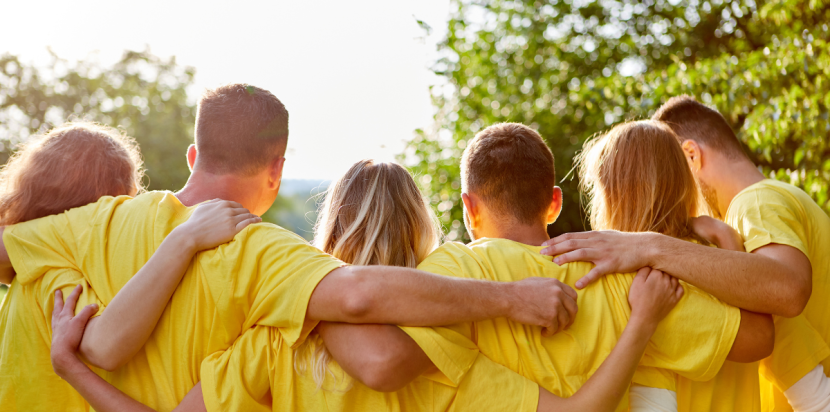 group of people embracing each other