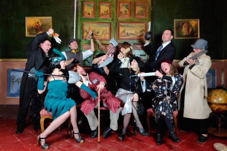 Employees dressed in character for a murder mystery indoor team building game in Malaysia